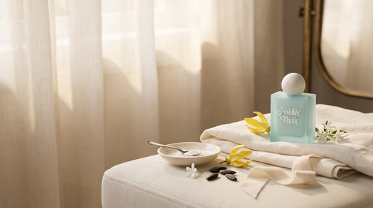 Powder Musk perfume styled in a soft cream Maqam Beauty scene